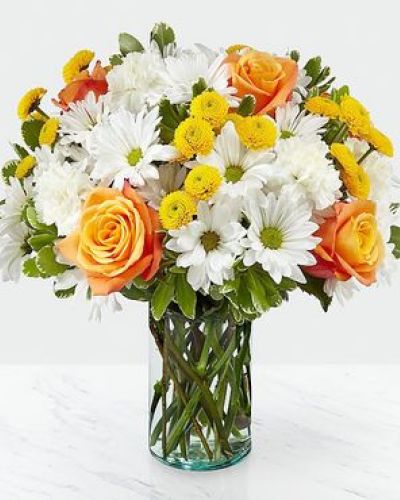 Through a collection of bold hues, gorgeous flowers, and fresh scents, this bouquet blossoms with beauty in any room that its placed. An array of orange roses, variegated pittosporum, and white daisy pompons come together in a cylindrical glass vase to make the perfect gift for a loved one near or far.
STANDARD bouquet is approx. 13H x 13W.
DELUXE bouquet is approx. 14H x 14W.
PREMIUM bouquet is approx. 15H x 15W.