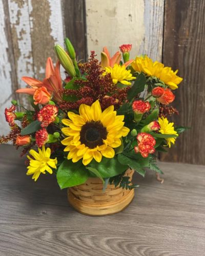 <p>Experience the splendor of autumn with this gorgeous floral arrangements. Crisp fall hues presented in a one of a kind container that will make any recipient smile!</p>
<hr />
<hr />
<p>&nbsp;</p>