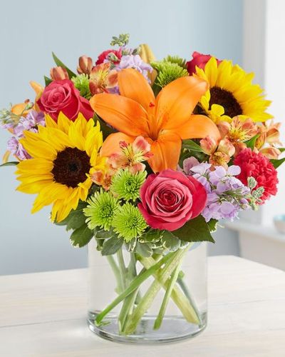 <p>Like a blast of spring weather, our vibrant bouquet delivers your sentiments to someone special. A rich gathering of yellow and orange blooms, with pops of bright pink and purple, it’s more than a gift – it’s a way to express how you feel inside.</p>